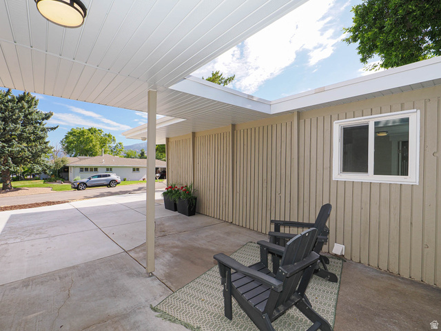 154 East 3000th Street South Bountiful, UT 84010 - Photo 31 of 37 Covered patio area featuring a white slatted ceiling, recessed lighting, and direct access to an exterior window
