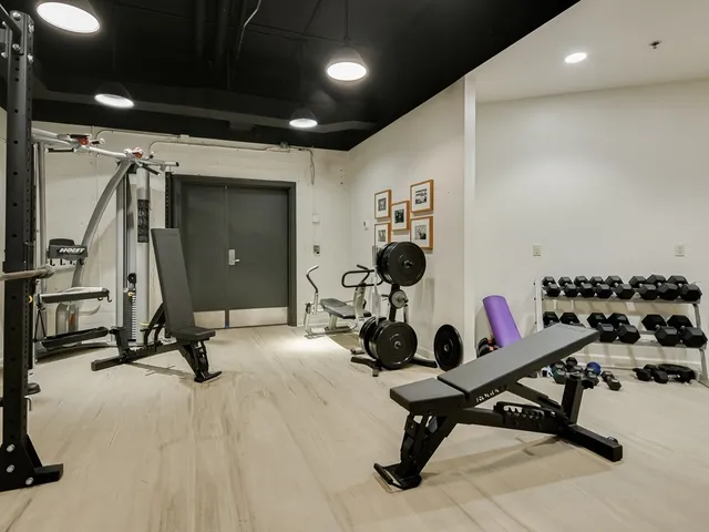 a view of a room with gym equipment