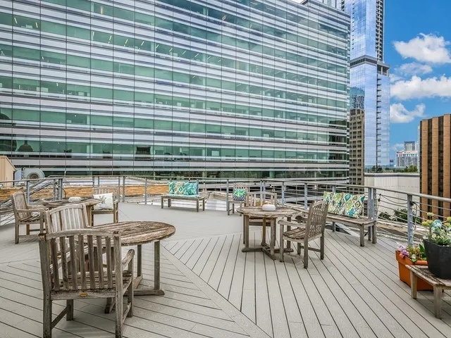 a view of a chairs and table on the wooden floor