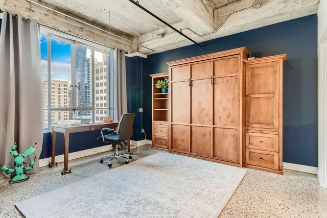 a view of a livingroom with furniture