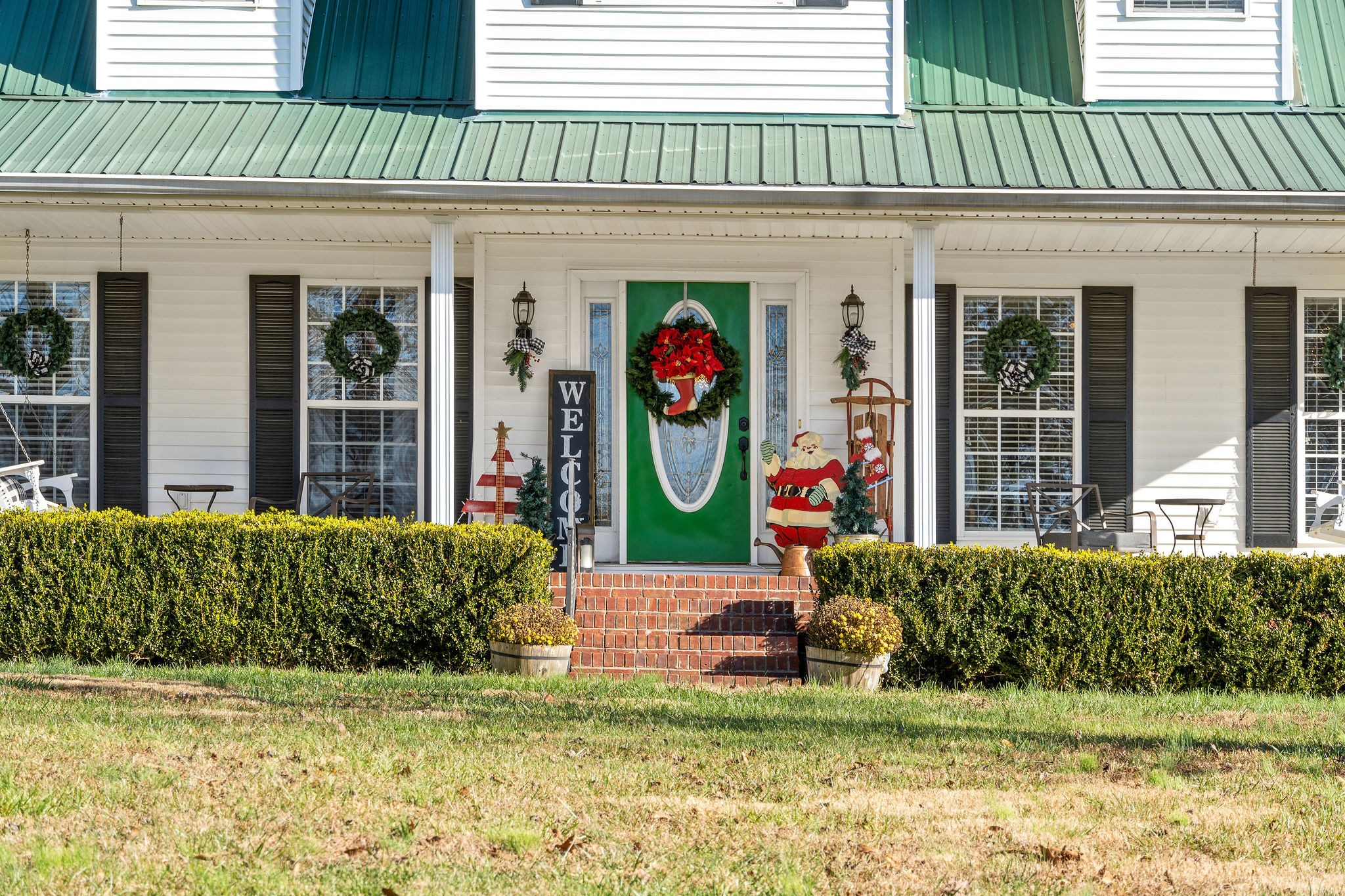 8610 Princeton Road Cerulean, KY 42215 - Photo 4 of 46 a view of a house with potted plants and a yard