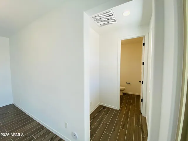 a bathroom with a double vanity sink mirror and double