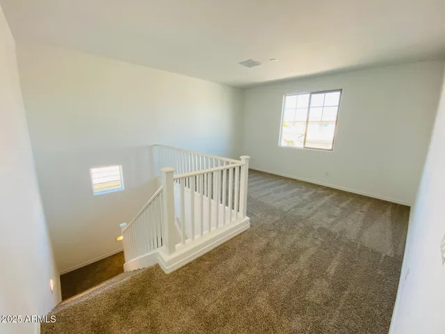 a view of a swimming pool and a yard