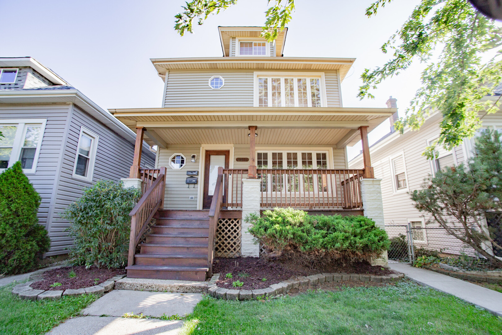 front view of a house with a yard