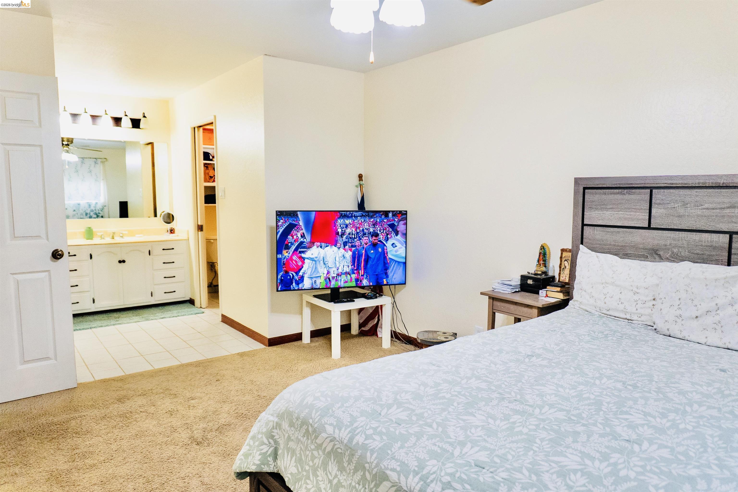 3513 Rio Grande Drive Antioch, CA 94509 - Photo 18 of 22 Carpeted bedroom area featuring a light wood-finish headboard
