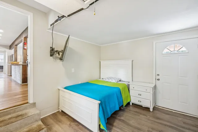 a bathroom with a sink a mirror and shower