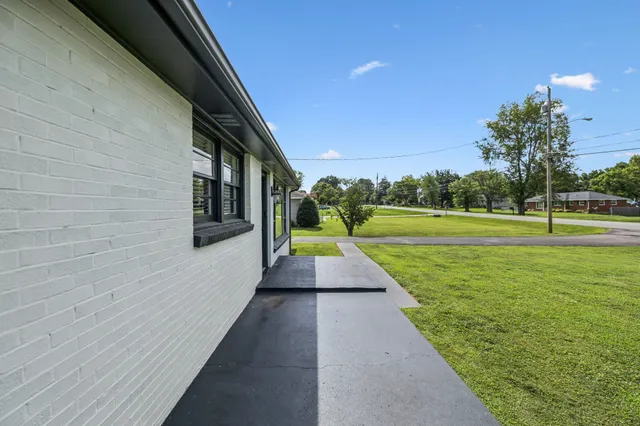 a view of a house with a garden