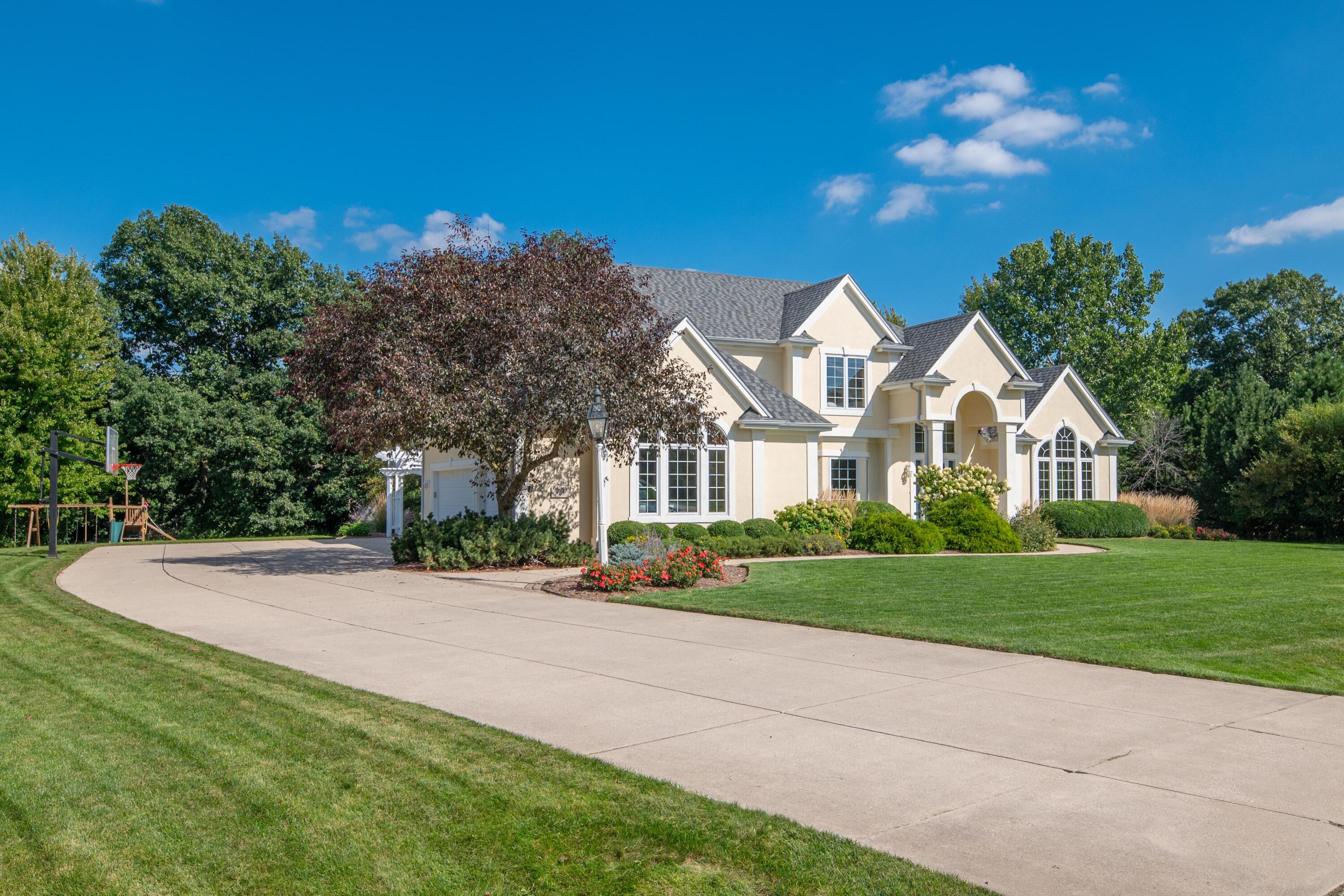 261 Steeple Pointe Circle Delafield, WI 53018 - Photo 21 of 70 Curb appeal is defined here.