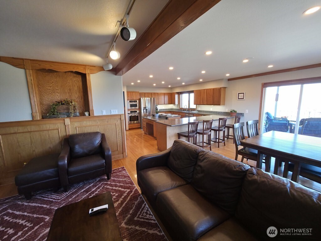 440 West Line Road Ephrata, WA 98823 - Photo 13 of 31 a living room with furniture and a large window