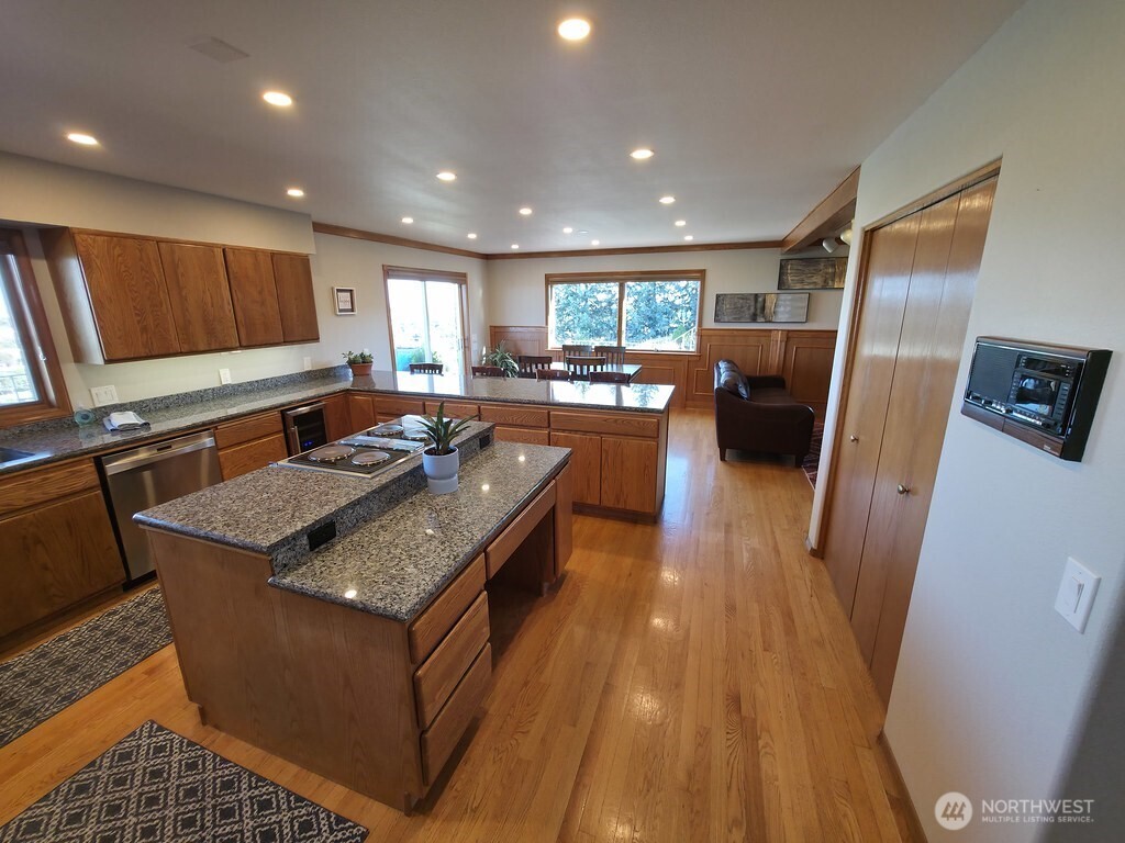 440 West Line Road Ephrata, WA 98823 - Photo 14 of 31 a kitchen with stainless steel appliances granite countertop a stove a sink a refrigerator and a microwave