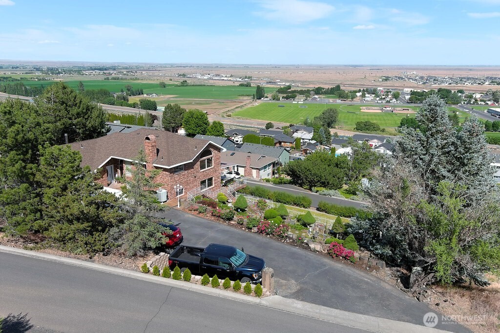440 West Line Road Ephrata, WA 98823 - Photo 2 of 31 an aerial view of a city with lots of residential buildings ocean and mountain view in back