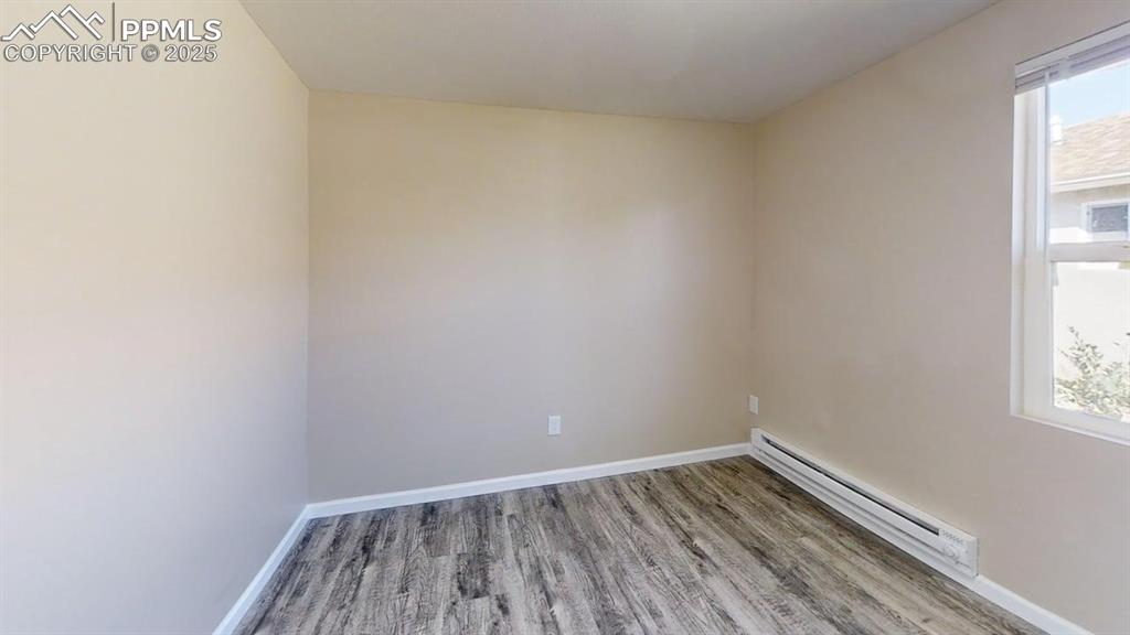 2405 East St Vrain Street Colorado Springs, CO 80909 - Photo 27 of 32 a view of wooden floor in an empty room