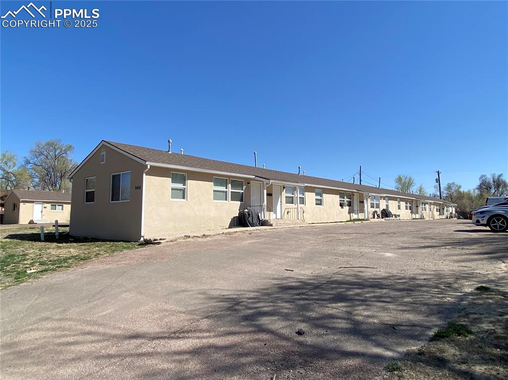 2405 East St Vrain Street Colorado Springs, CO 80909 - Photo 32 of 32 a view of a house with a outdoor space
