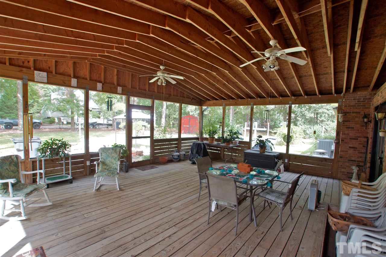 9449 Ferrell Road Zebulon, NC 27597 - Photo 23 of 28 What is not to love about this screen porch. Perfect for entertaining family and friends