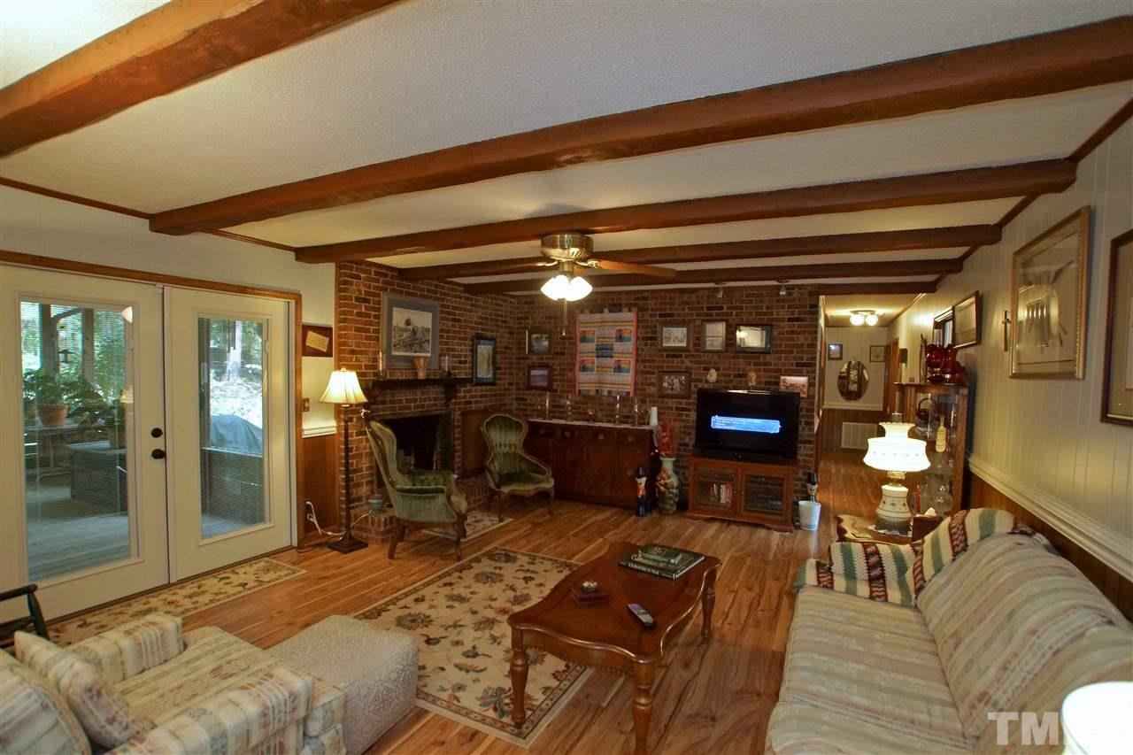 9449 Ferrell Road Zebulon, NC 27597 - Photo 5 of 28 Perfect setting for the family. French doors provides entry to Screen Porch.