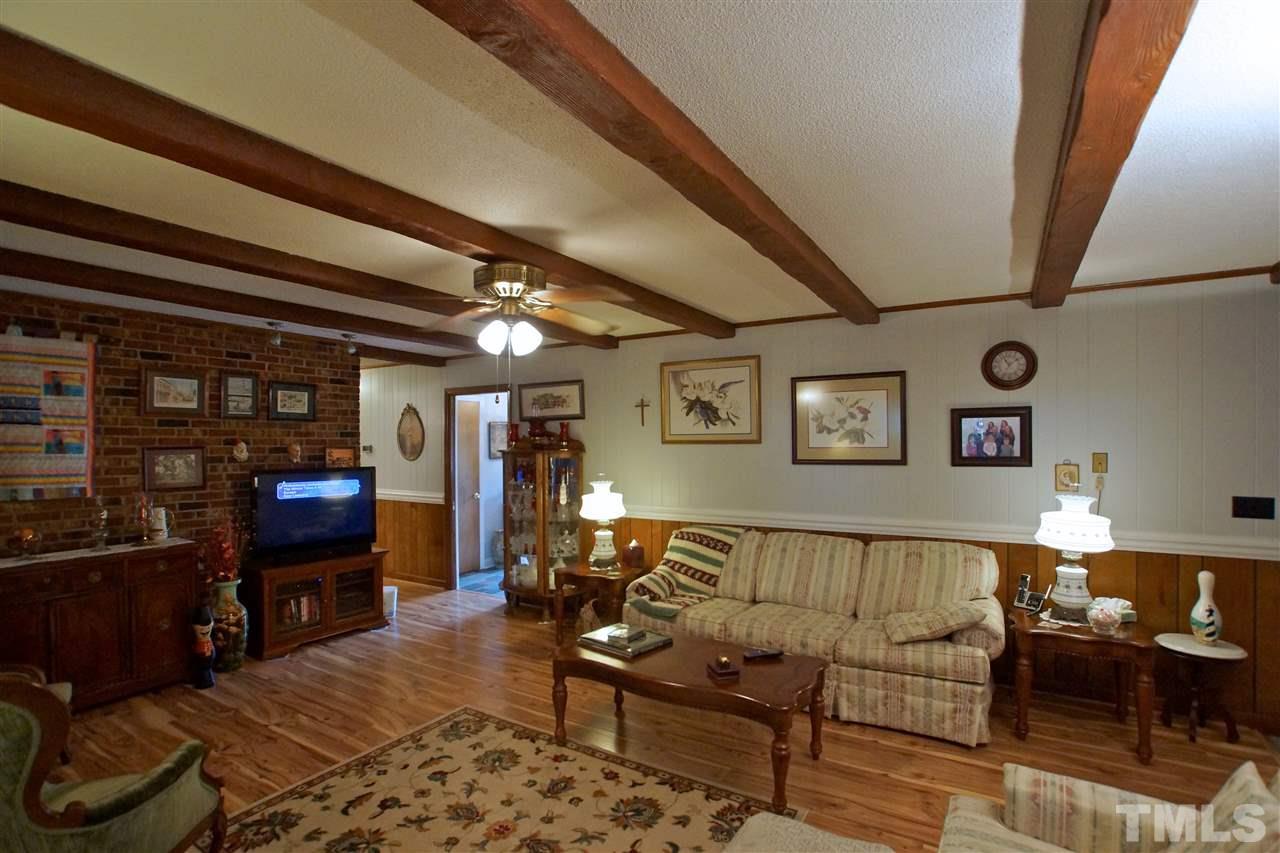 9449 Ferrell Road Zebulon, NC 27597 - Photo 6 of 28 Large family room for entertaining family and friends