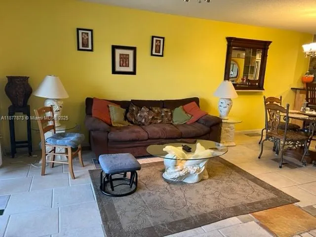 a living room with furniture and a couch