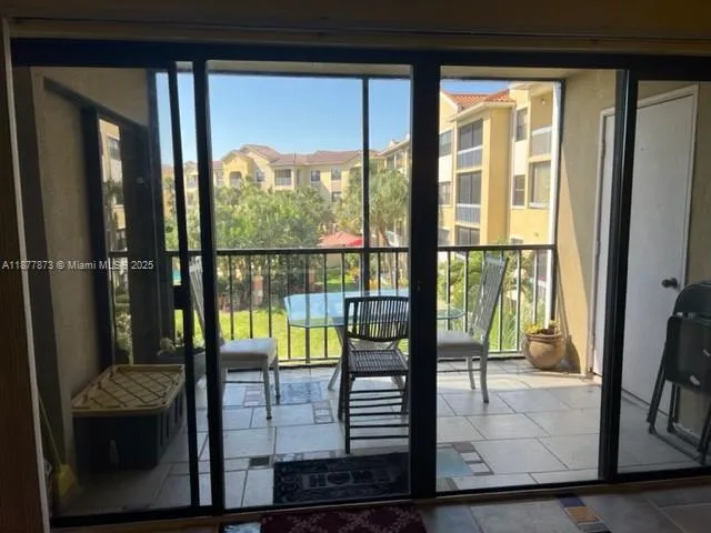 a view of a glass door with a glass door
