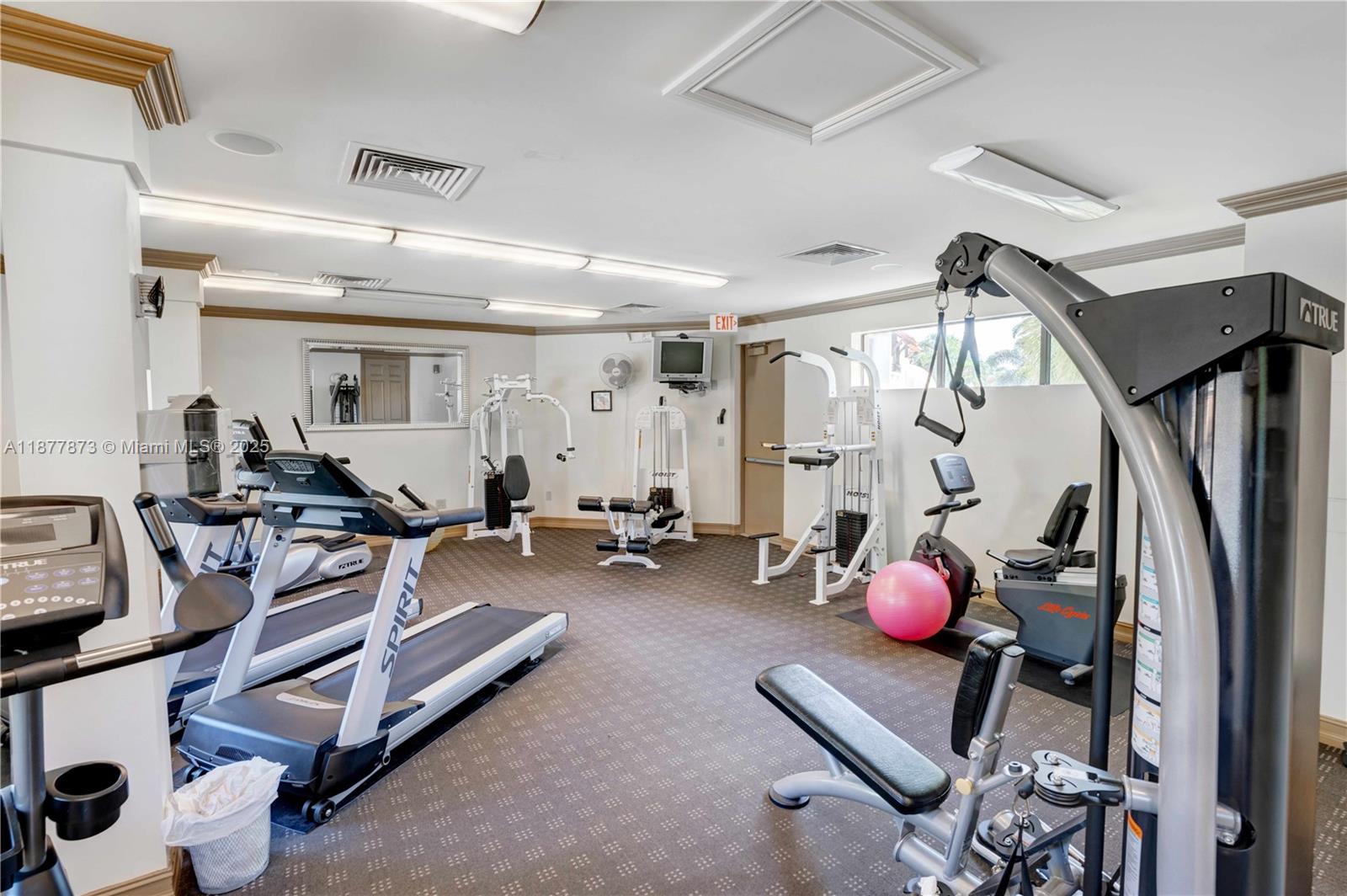 600 Uno Lago Drive, Unit 302 Juno Beach, FL 33408 - Photo 10 of 11 a view of a room with gym equipment