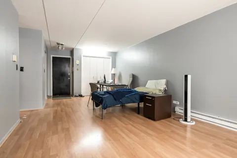 a view of a workspace with furniture