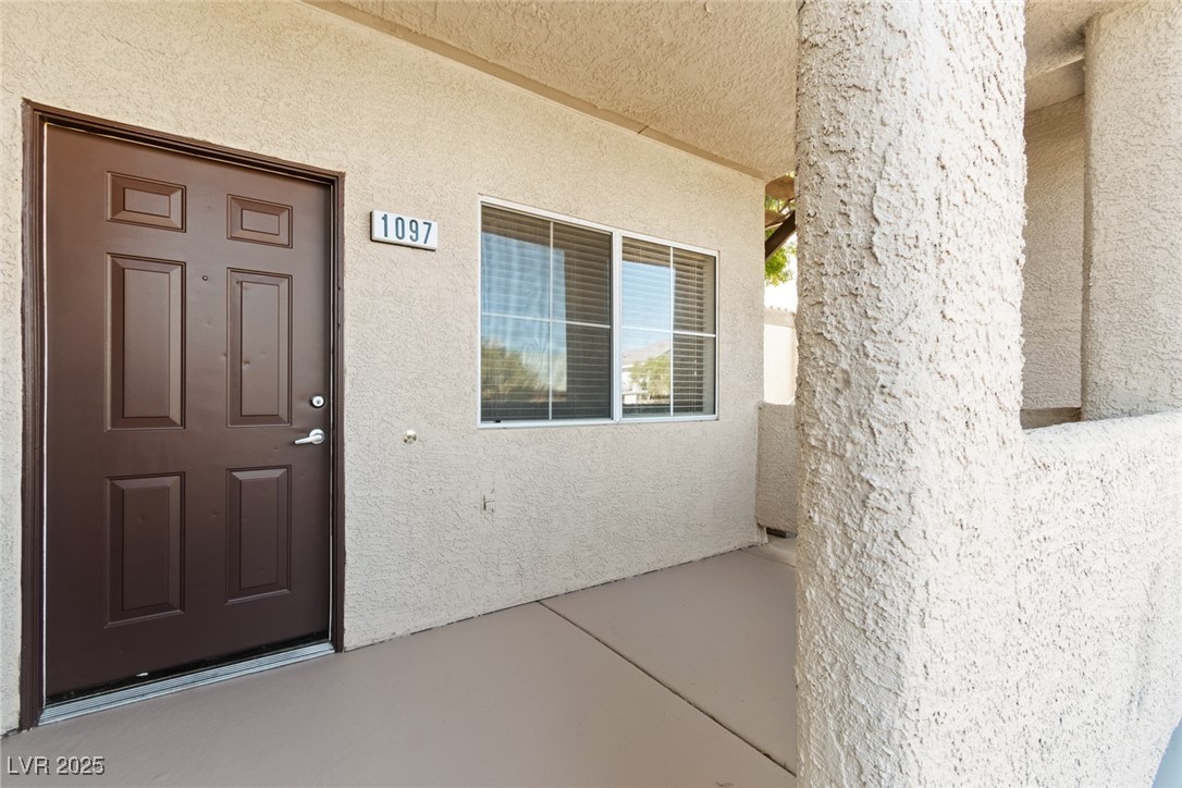 5250 South Rainbow Boulevard, Unit 1097 Las Vegas, NV 89118 - Photo 4 of 10 Entrance to property with stucco siding