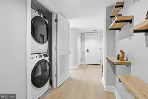 a view of living room with furniture and window