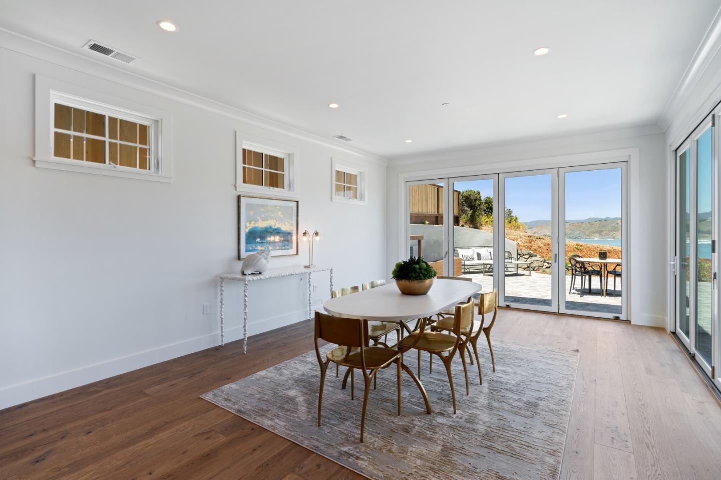 277 Kent Road Pacifica, CA 94044 - Photo 29 of 88 a view of a dining room with furniture and wooden floor
