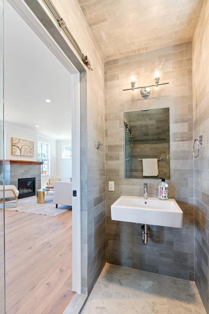 277 Kent Road Pacifica, CA 94044 - Photo 38 of 88 a bathroom with a sink and a mirror