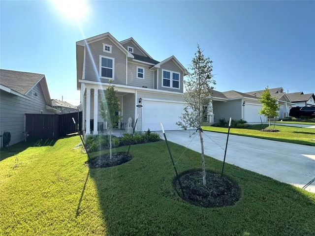 a house view with a garden space