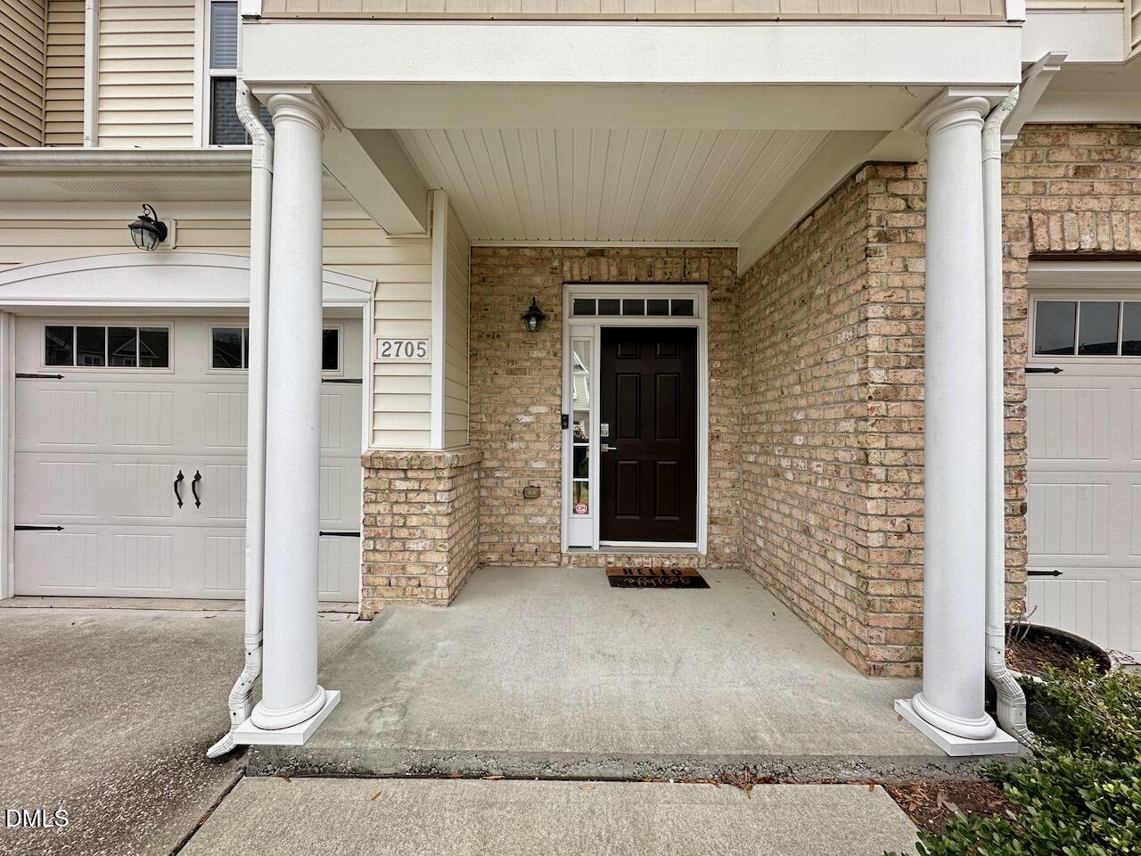 2705 Casper Creek Lane Raleigh, NC 27616 - Photo 2 of 35 a view of a brick house with outdoor space