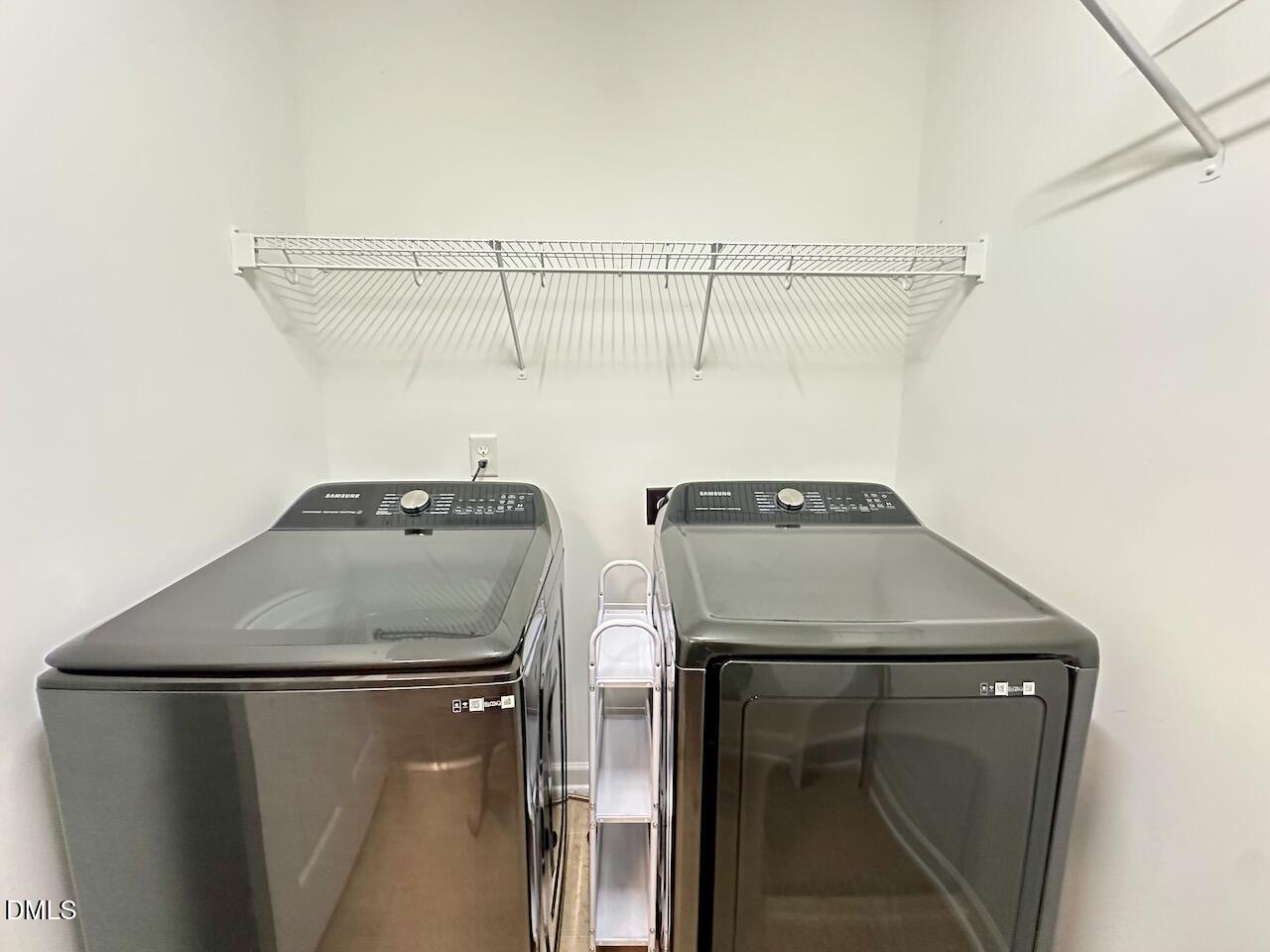 2705 Casper Creek Lane Raleigh, NC 27616 - Photo 25 of 35 a utility room with dryer and washer