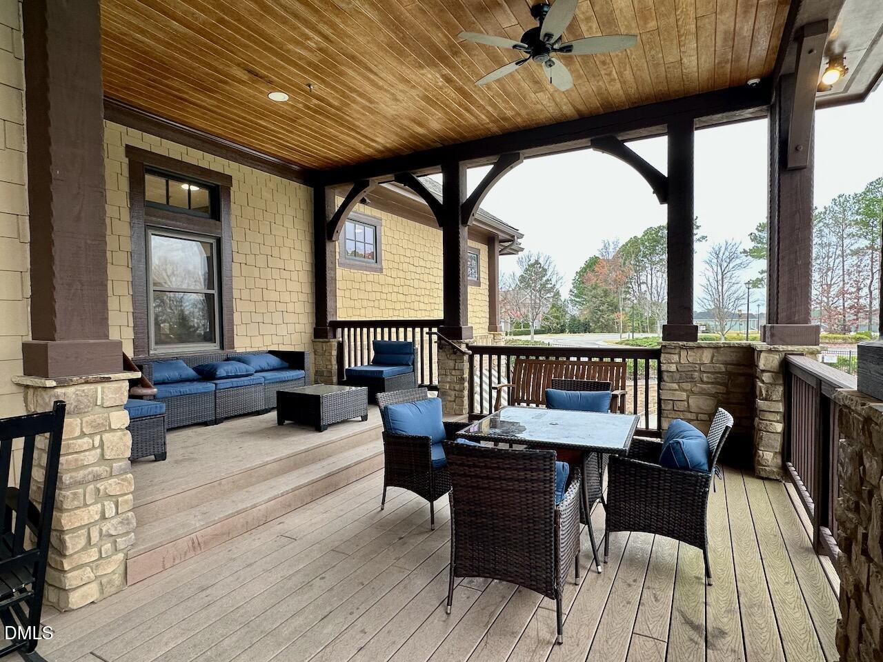 2705 Casper Creek Lane Raleigh, NC 27616 - Photo 33 of 35 a living room with furniture and a large window