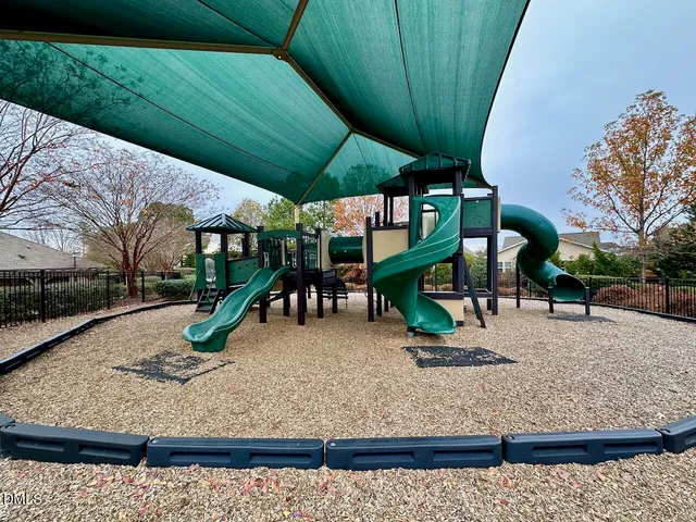 a view of a backyard with a patio