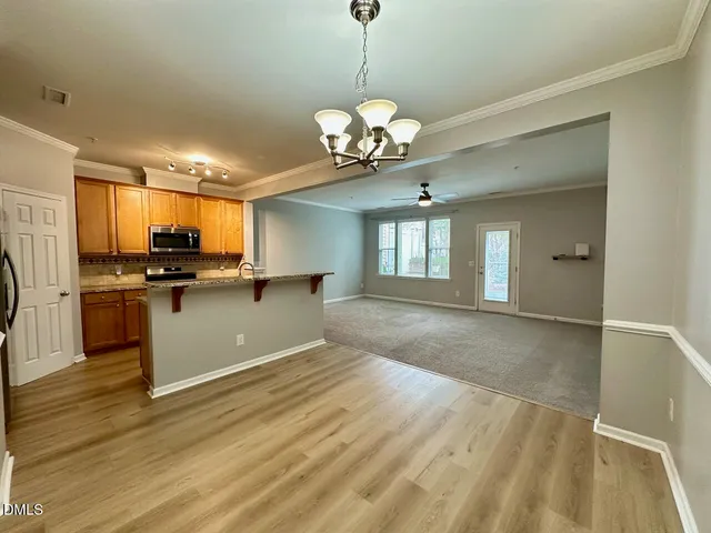 a view of a kitchen with a sink and dishwasher