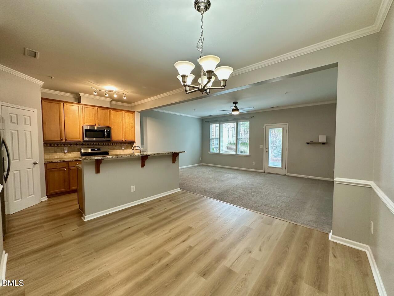 2705 Casper Creek Lane Raleigh, NC 27616 - Photo 6 of 35 a view of a kitchen with a sink and dishwasher