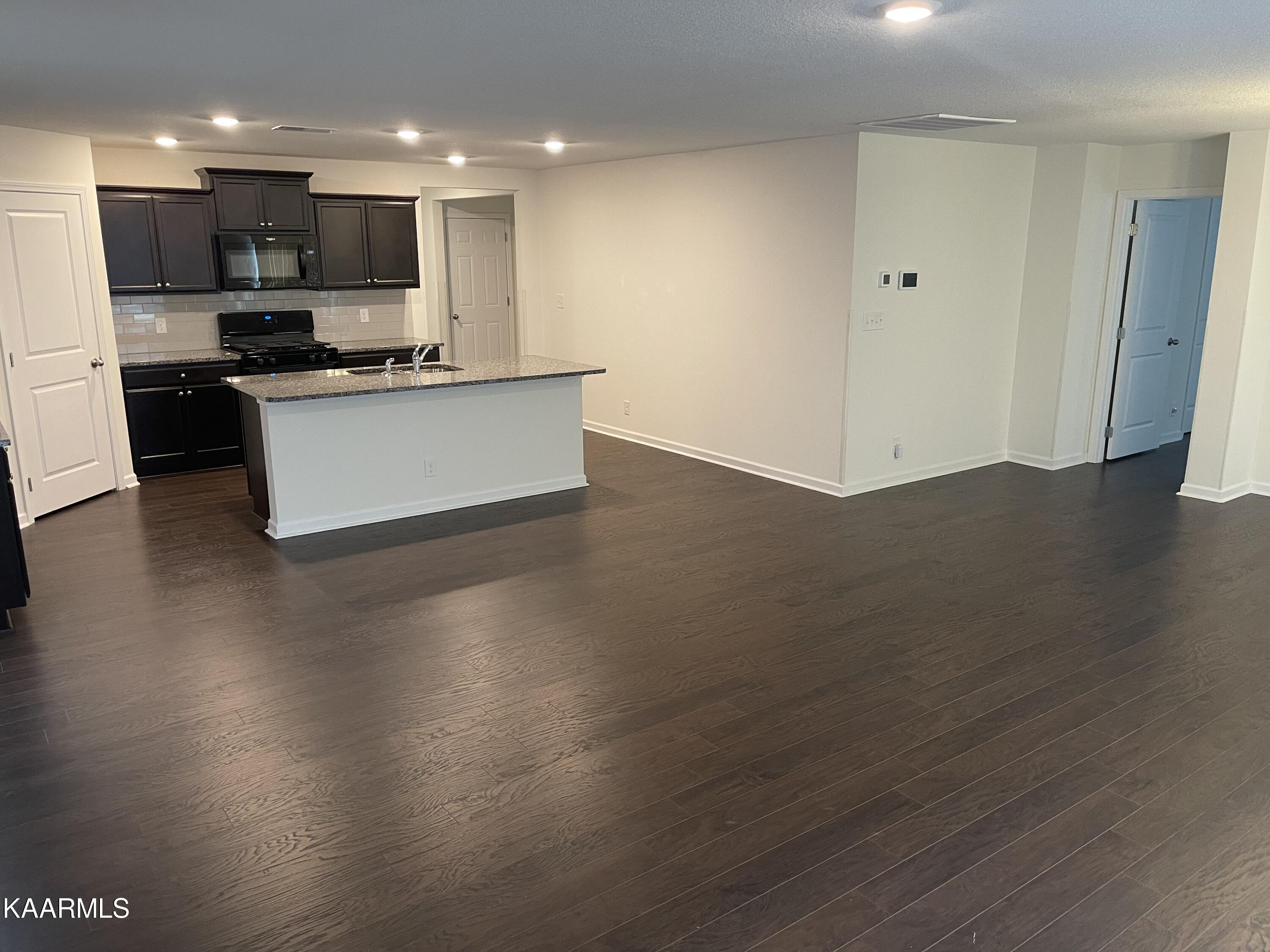 1629 River Poppy Road Mascot, TN 37806 - Photo 13 of 23 Living/Dining Area to Kitchen