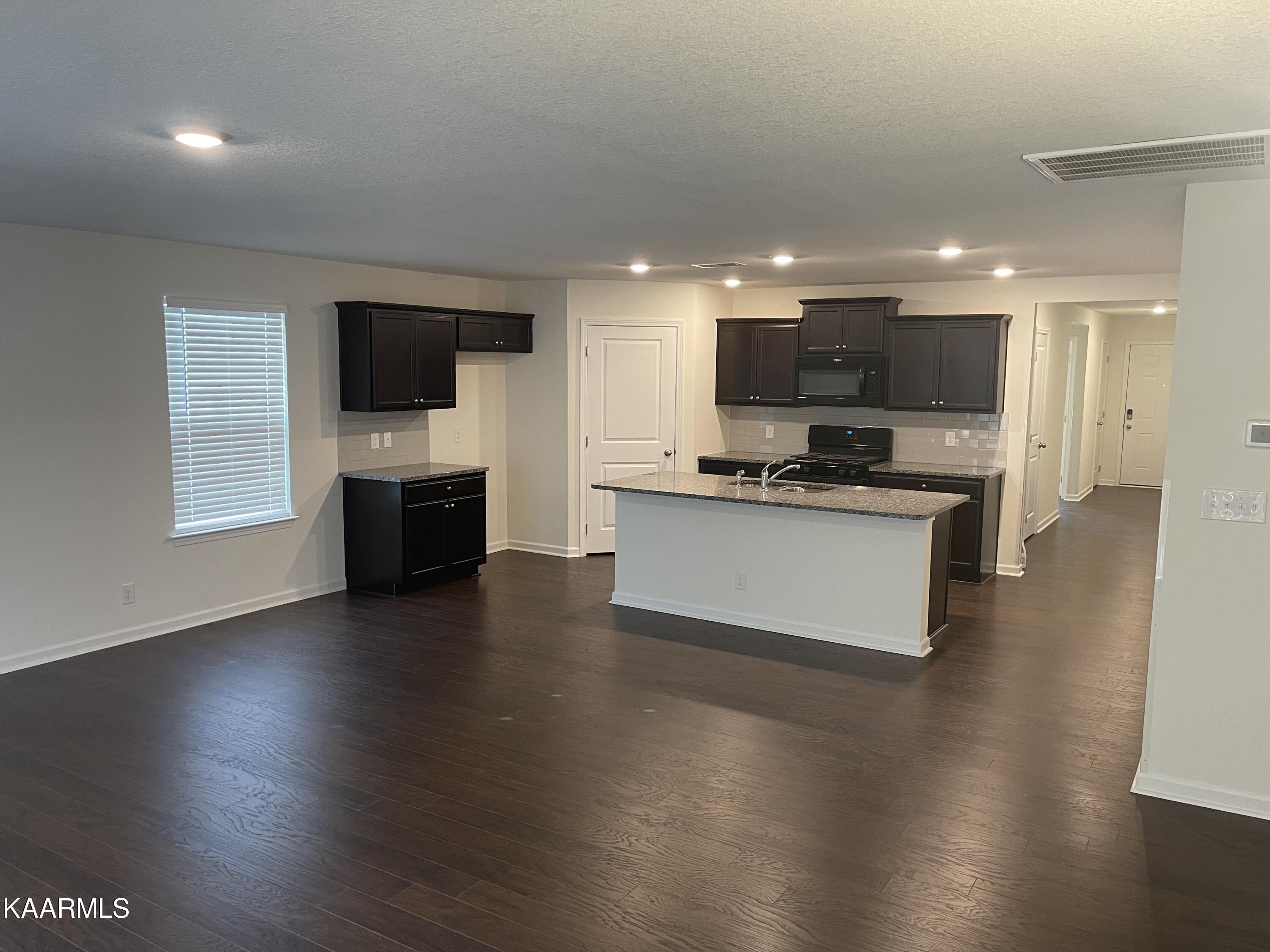 1629 River Poppy Road Mascot, TN 37806 - Photo 16 of 23 Living Area to Kitchen
