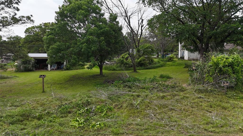 7159 Base Street Azle, TX 76020 - Photo 2 of 5 a view of a park with a tree