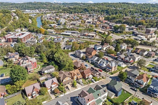 an aerial view of a city with lots of residential buildings