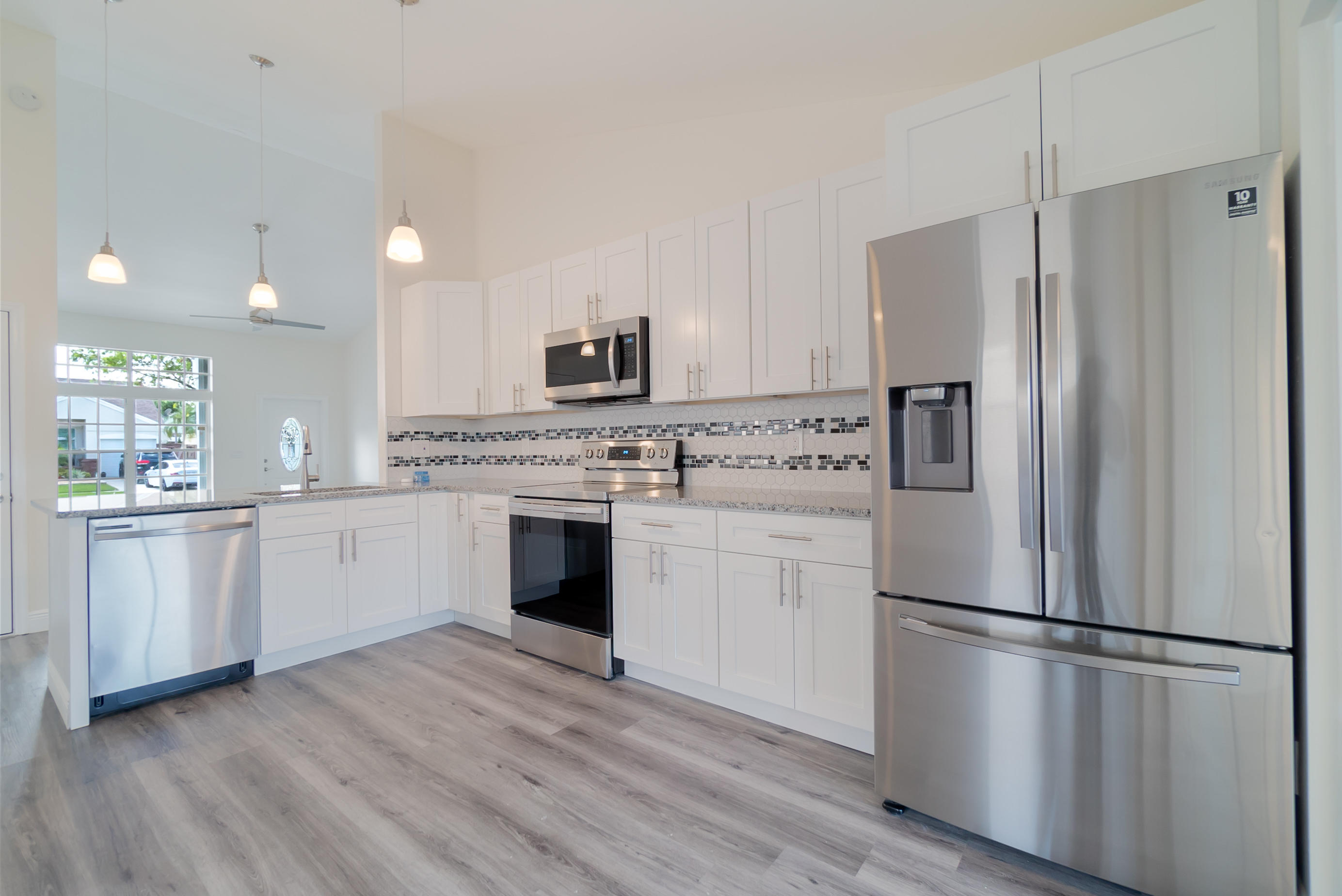 23040 Floralwood Lane Boca Raton, FL 33433 - Photo 5 of 31 Open Kitchen