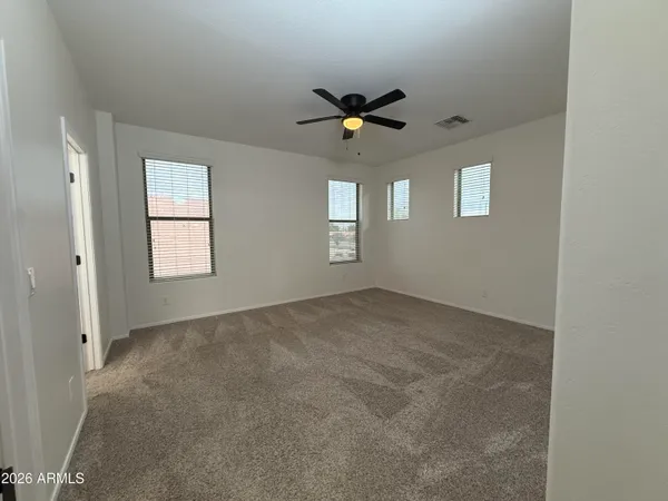 an empty room that has a window