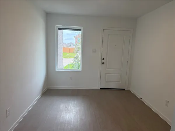 a kitchen with stainless steel appliances a refrigerator sink and microwave