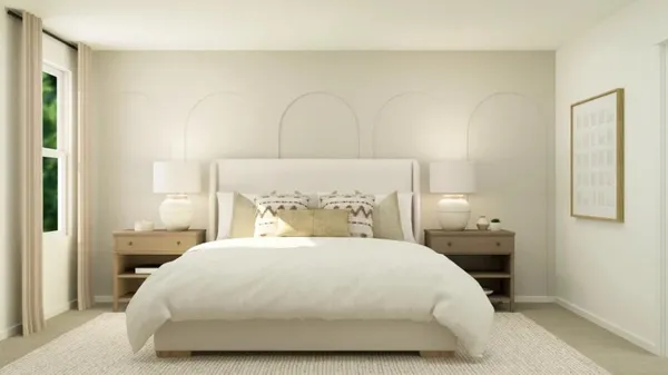 a bedroom with a bed and a night stand