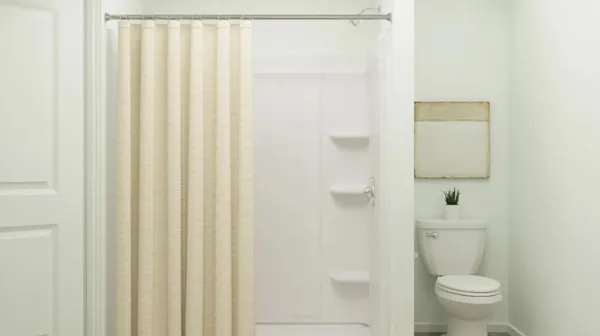 a bathroom with a toilet and a sink