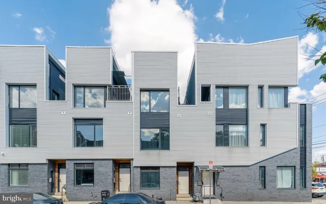 a front view of residential houses