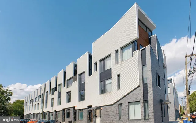 a view of a building with a white door