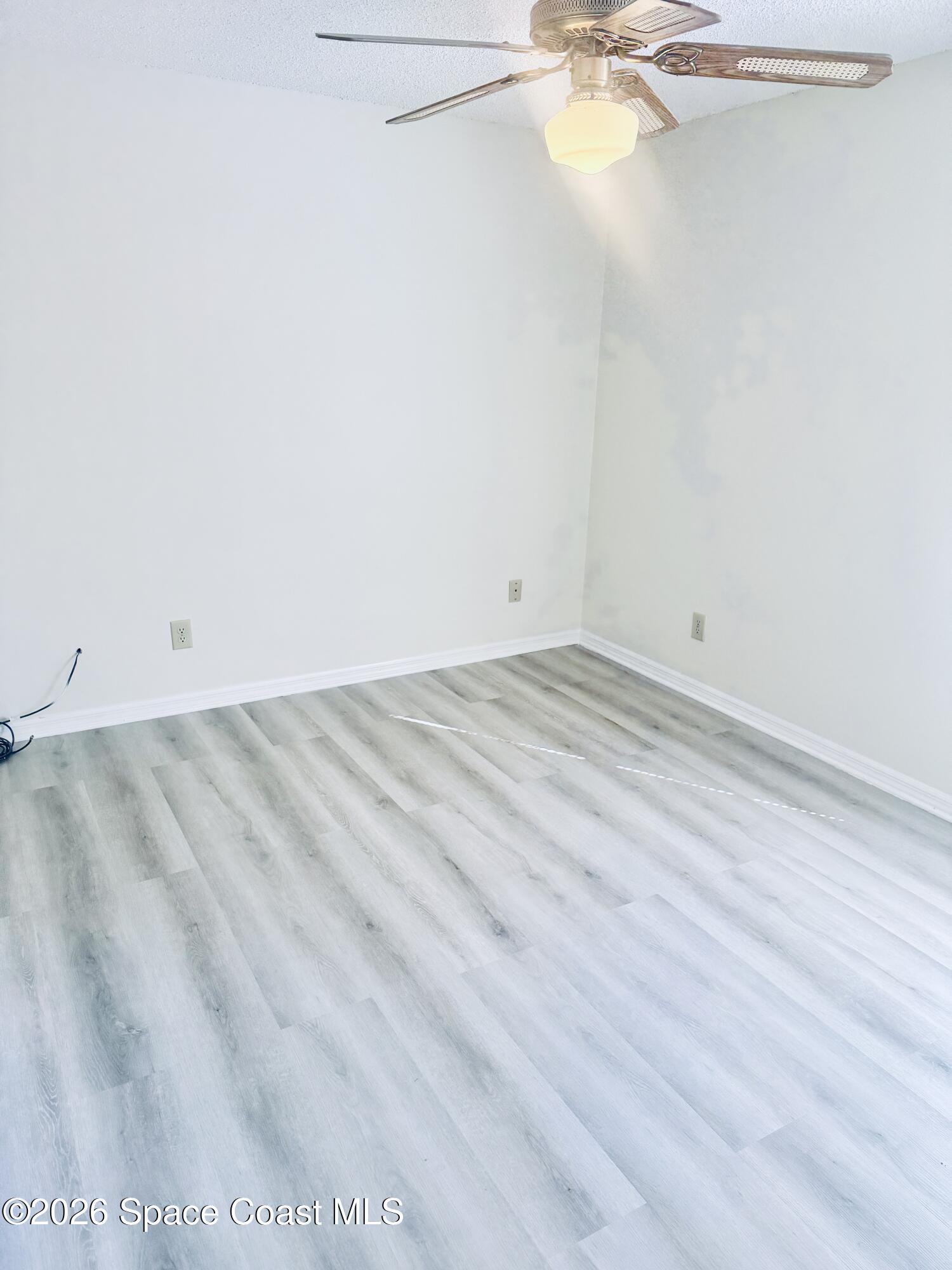 4795 Riverside Road Palm Shores, FL 32935 - Photo 23 of 33 a view of a room with a ceiling fan