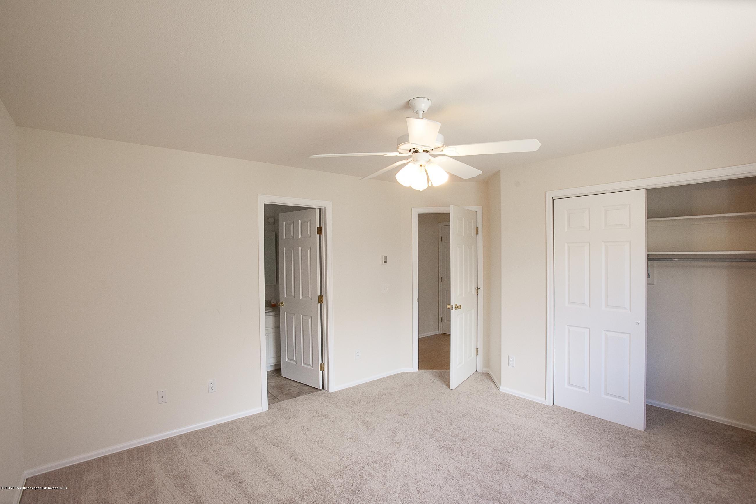 413 Evergreen Drive Rifle, CO 81650 - Photo 7 of 19 an empty room with a bathroom