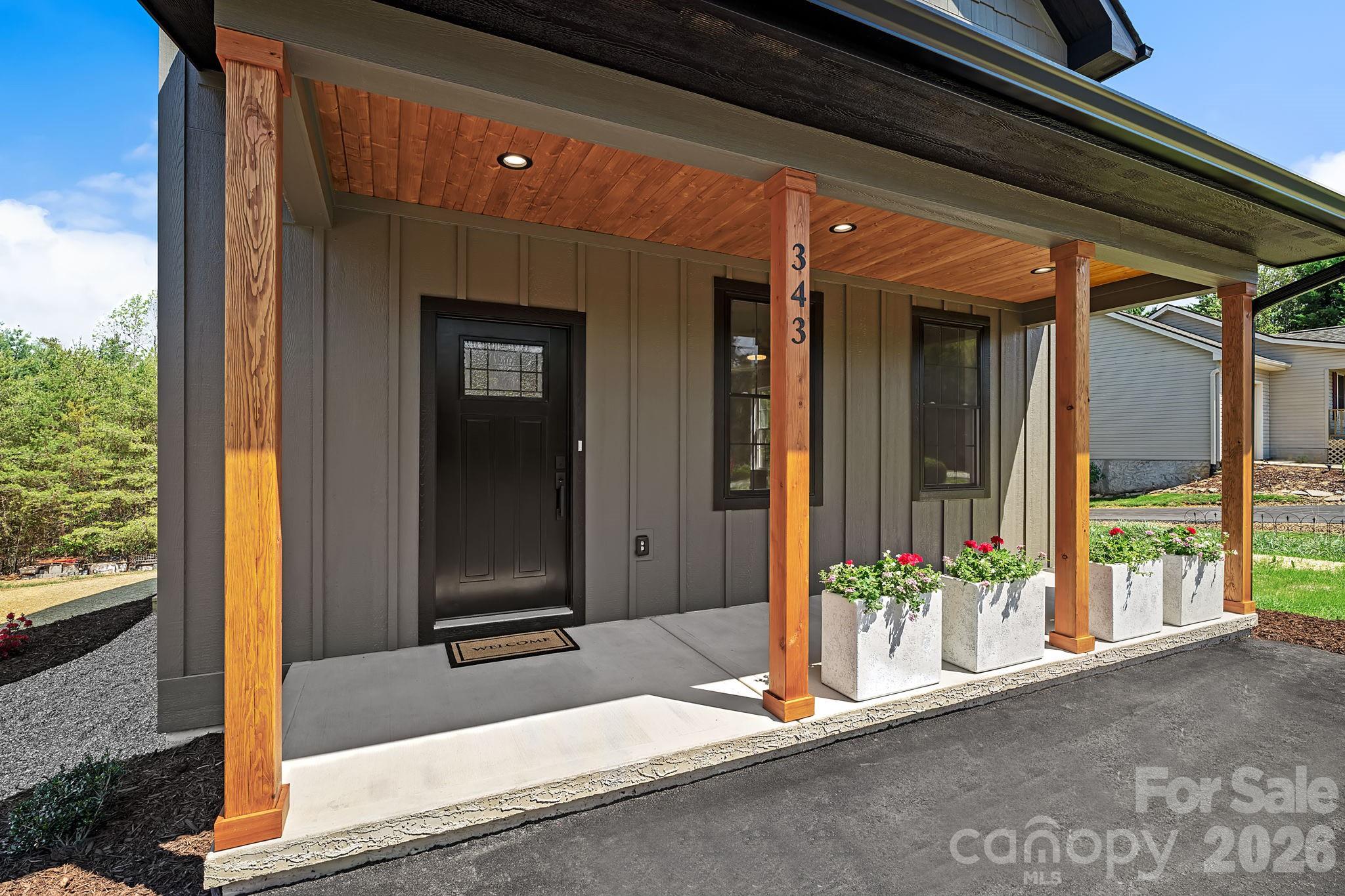 343 Olivette Road Asheville, NC 28804 - Photo 2 of 29 a front view of a house with a porch