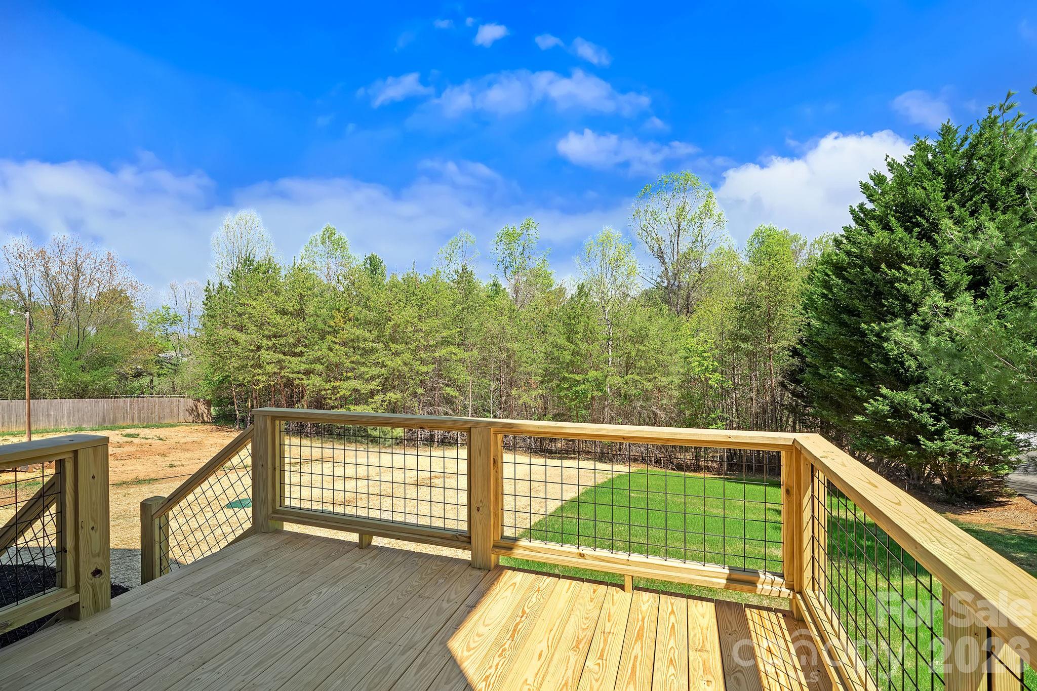 343 Olivette Road Asheville, NC 28804 - Photo 24 of 29 a view of a balcony with wooden floor and fence
